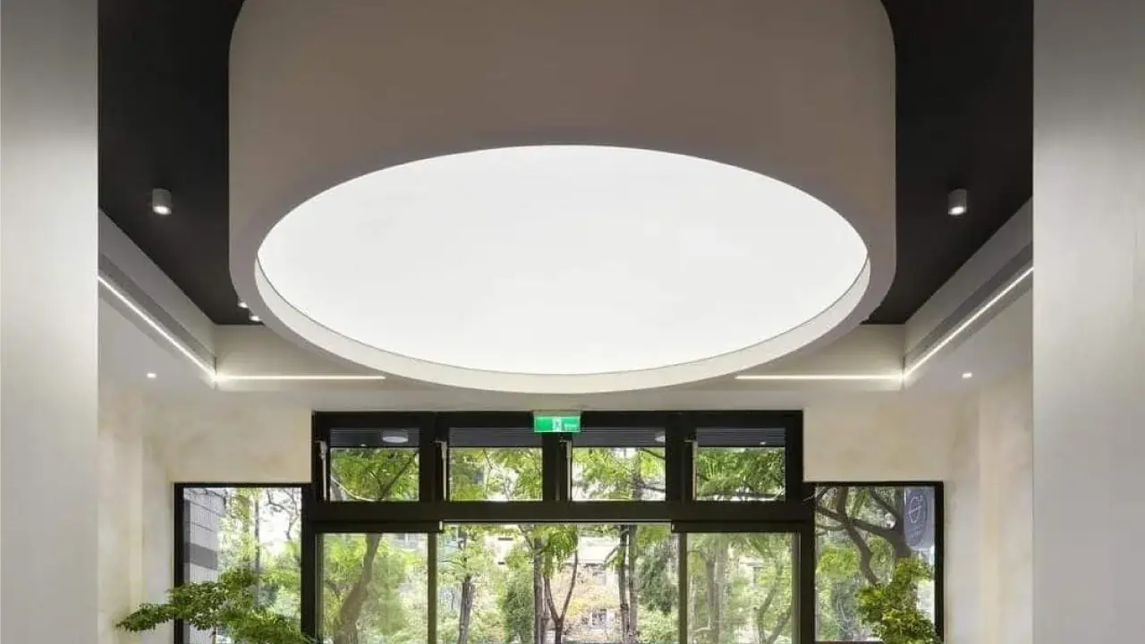 circular acoustic stretch ceiling with natural daylight effect in bangkok