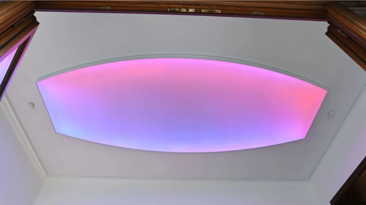 oval stretch ceiling with gradient rgb pink and purple lighting